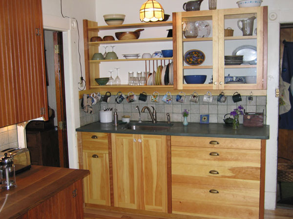 This kitchen is about as simple as cabinetry gets, while still providing the drawers I think are essential.