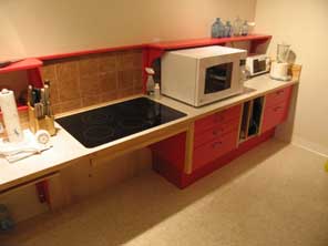 Accessible features: lowered counter, large kneespace, flush cooktop, tabletop oven.